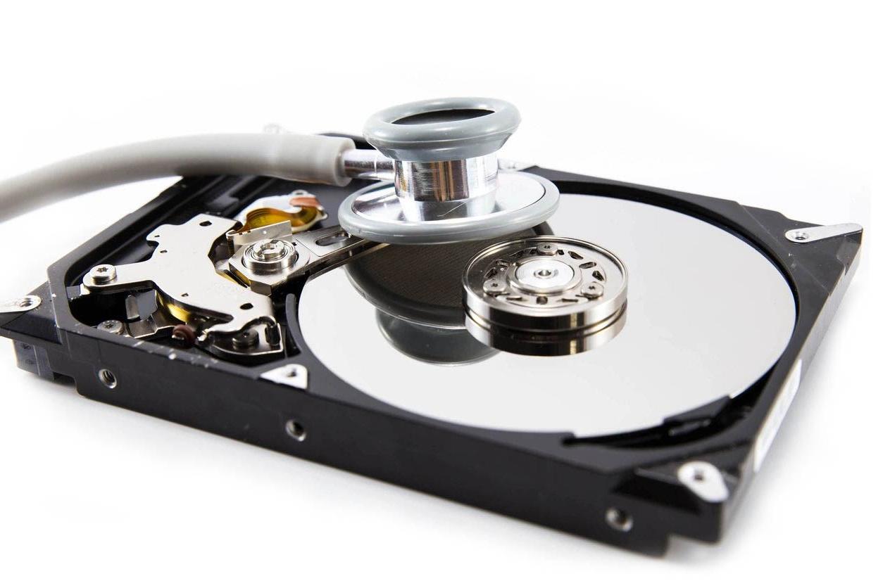 Hard Drive with Stethoscope - IT Services Graphic